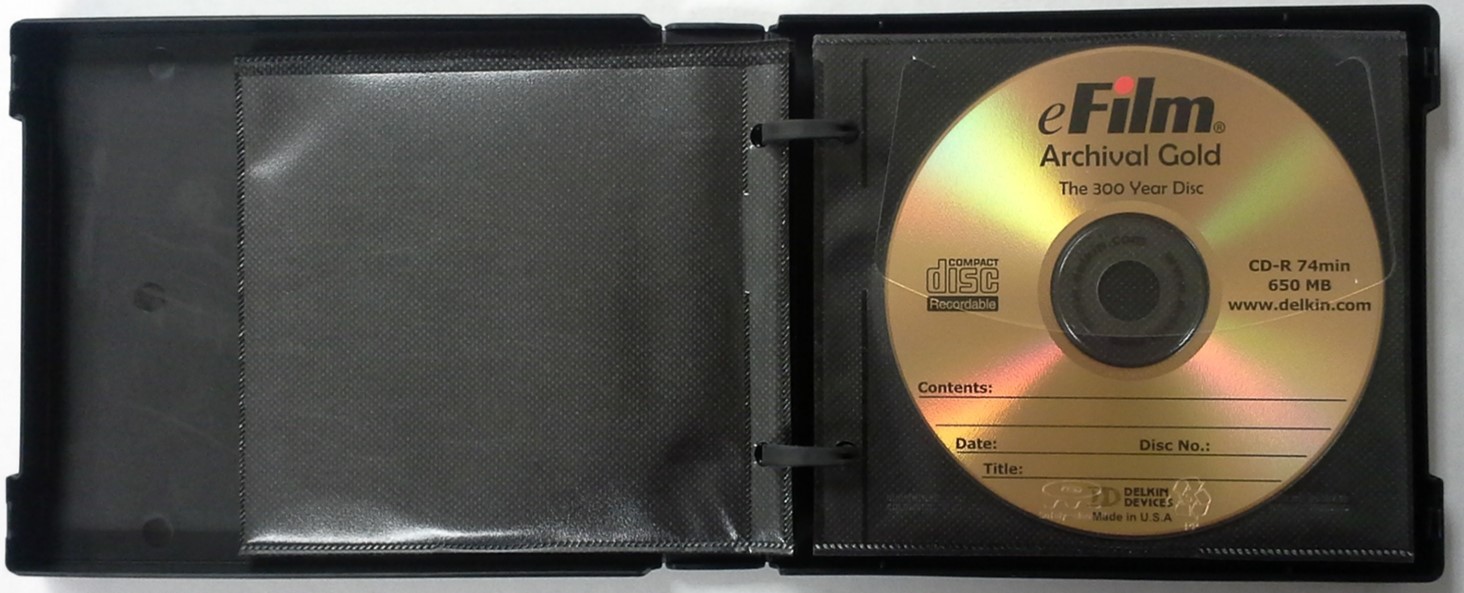 A cd wallet or storage album with sleeves. A chemically stable gold disc is stored inside of the album.