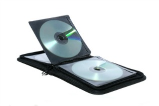 A disc wallet or album with plastic sleeves for storing CDs and other types of optical discs.