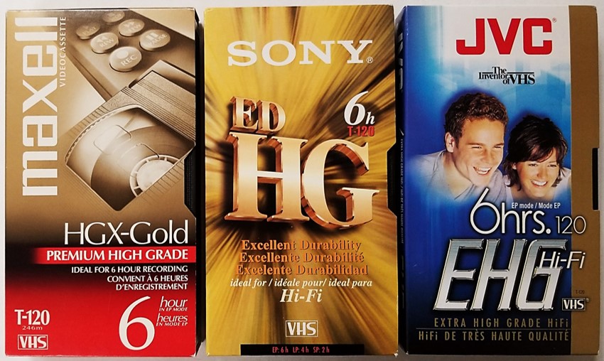 Blank VHS videotape brands from Maxell, Sony, and JVC in the T-120 length format.