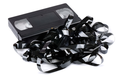 Badly wrinkled and damaged VHS video cassette tape might be repairable with splicing for breaks or heat and pressure for smoothing out the wrinkles.
