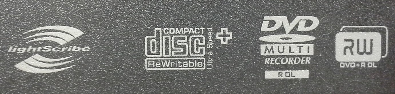 Faceplate of a CD and DVD recording drive showing the compact disc rewriteable Ultra High Speed Plus logo. Other logos shown are LightScribe and DVD Multi for dual layer disc.