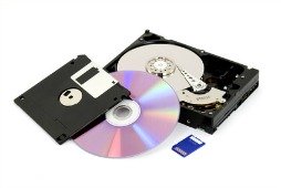 A variety of digital storage media for storing digital photos such as an optical disc, flash card, and hard drive.