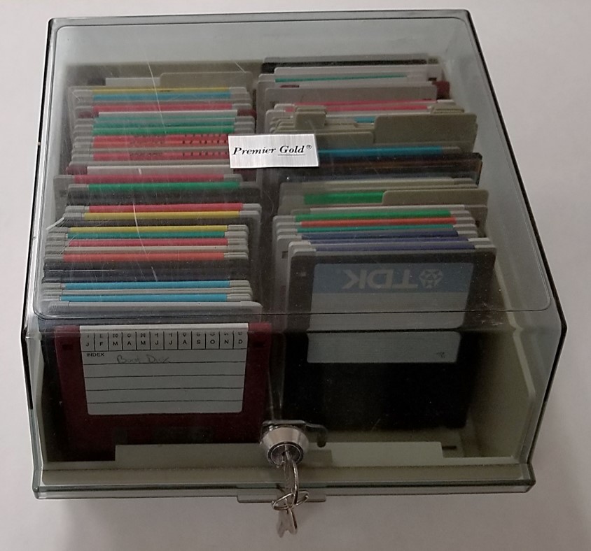 A floppy disk storage case for the vertical storage of 3.5-inch diskettes. This case provides physical protection, excludes dust and debris, and comes with a lock for some security.