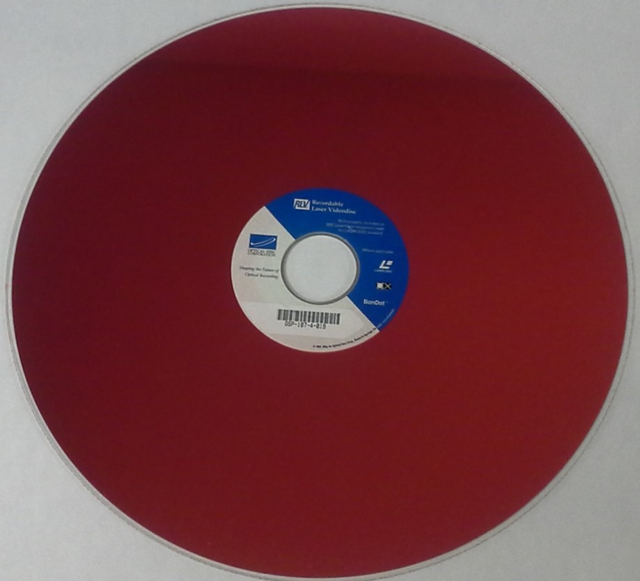 A recordable laser video disc or RLV can be easily identified by the violet color of the dye used in the disc to store the digital information.
