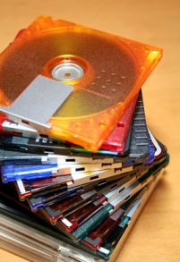 A stack of magneto-optical or MO optical disks. These disks are erasable.